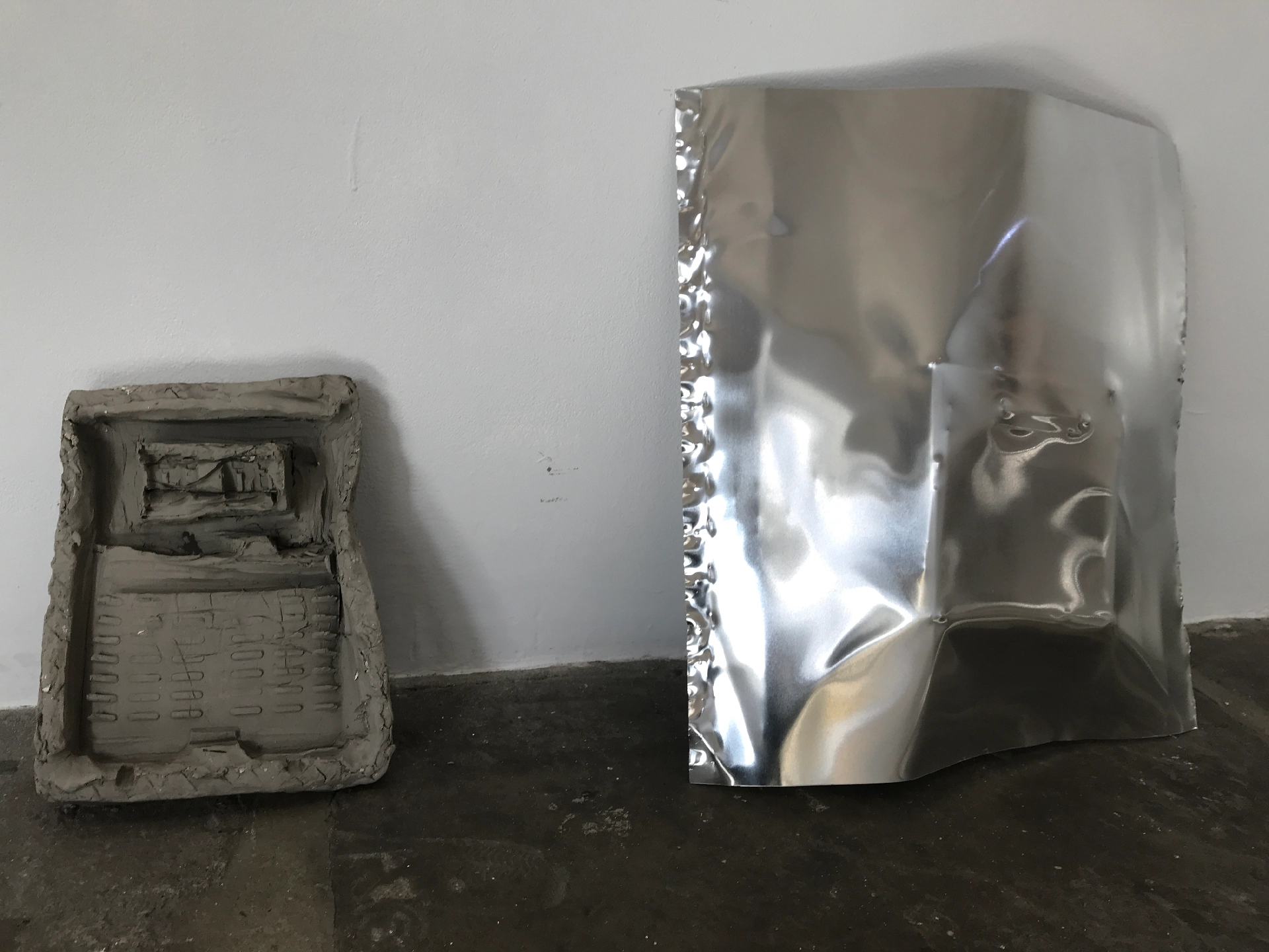 Unfired clay & aluminium sheet