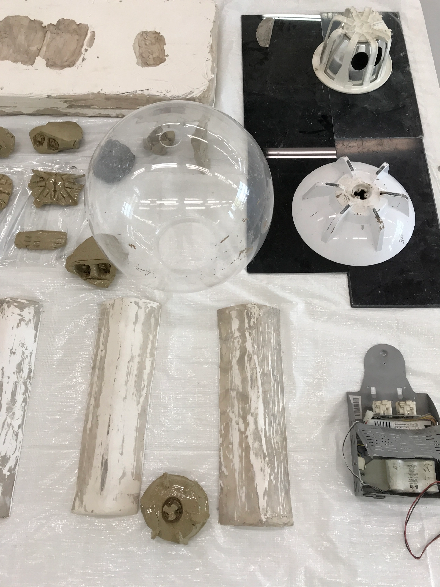 Tarpoulin, acrylic, found objects, plastic, glazed ceramic, plaster, unfired clay, 25mm steel square-tube, 3D printed SLS plastic