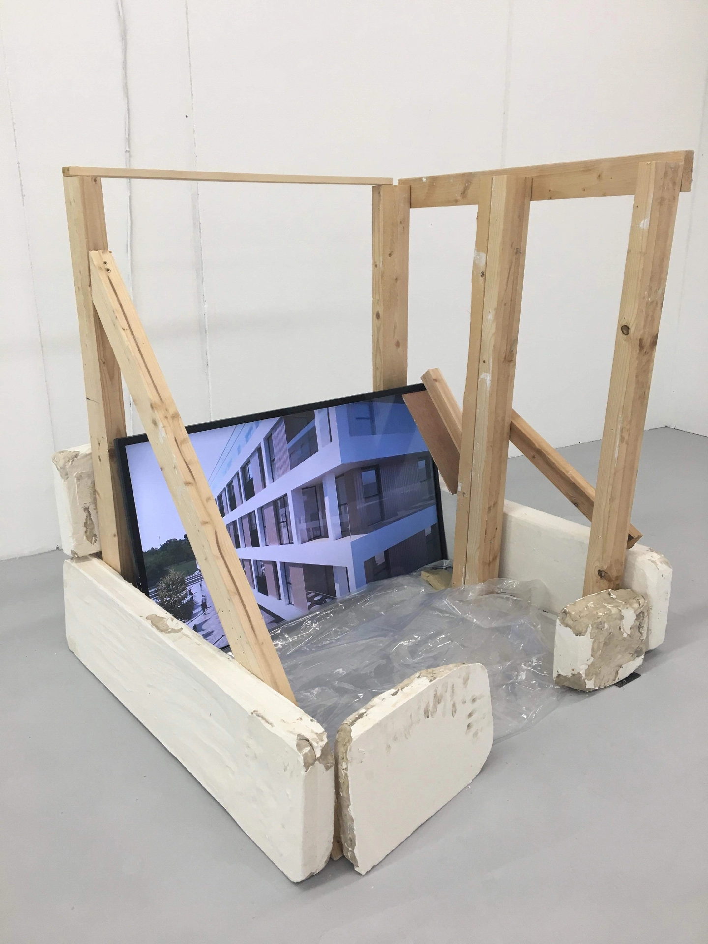 Wood, plaster, clay, plastic sheet, glazed ceramic, pen, TV, metal off-cuts, still image