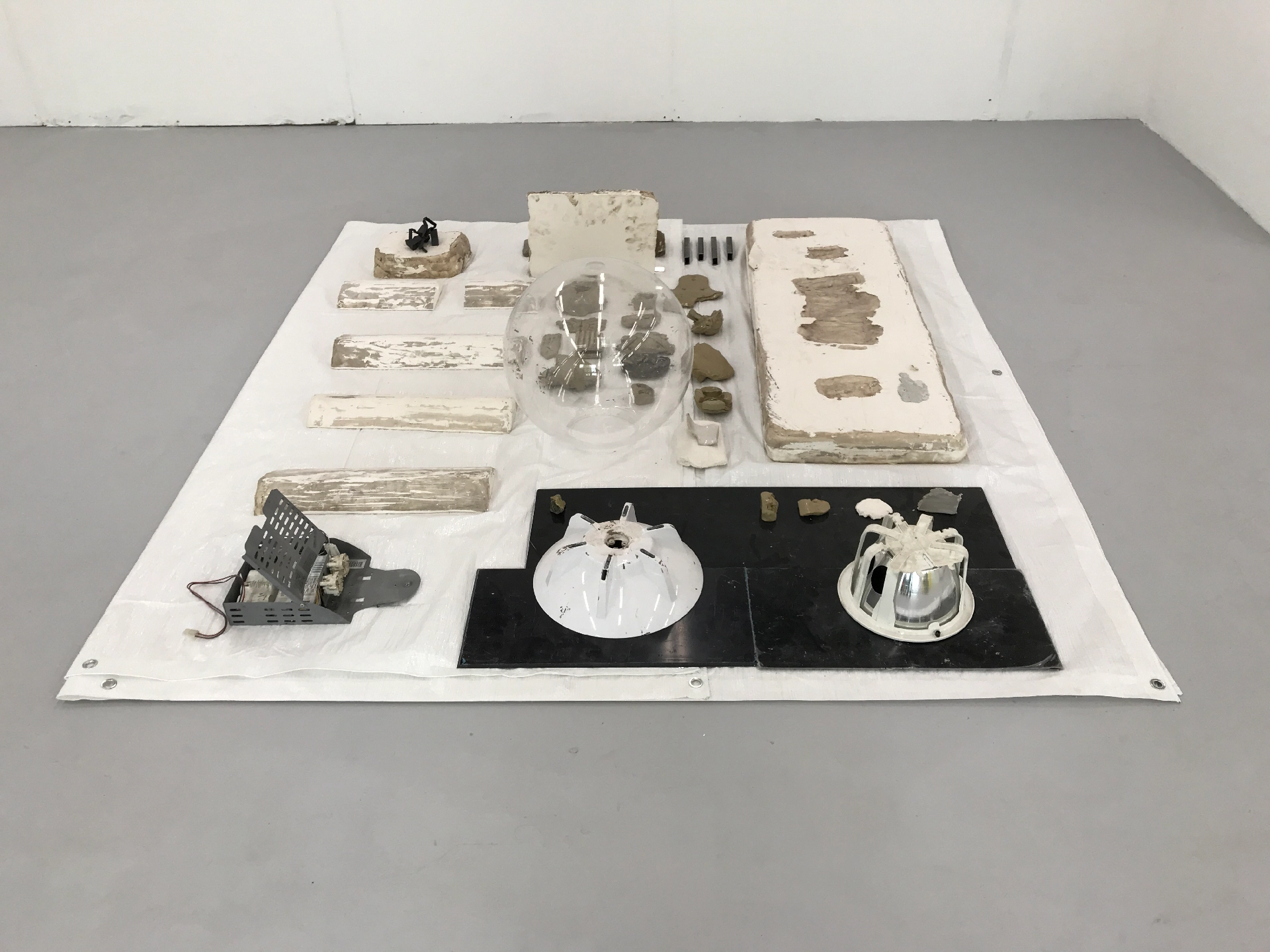 Tarpoulin, acrylic, found objects, plastic, glazed ceramic, plaster, unfired clay, 25mm steel square-tube, 3D printed SLS plastic