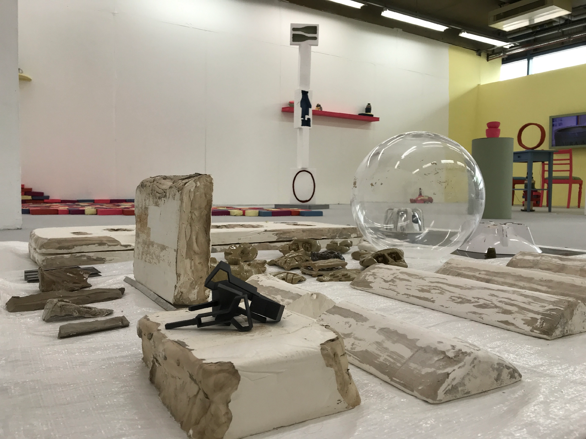 Tarpoulin, acrylic, found objects, plastic, glazed ceramic, plaster, unfired clay, 25mm steel square-tube, 3D printed SLS plastic